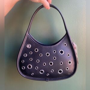 new with tags Coach Ergo Bag In Pebbled Coachtopia Leather: Grommets size small.